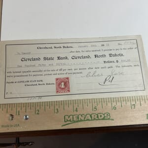 IMG_2299 1916 Cleveland State Bank of Cleveland North Dakota hand canceled 4 cent revenue stamped check with normal folds and creases