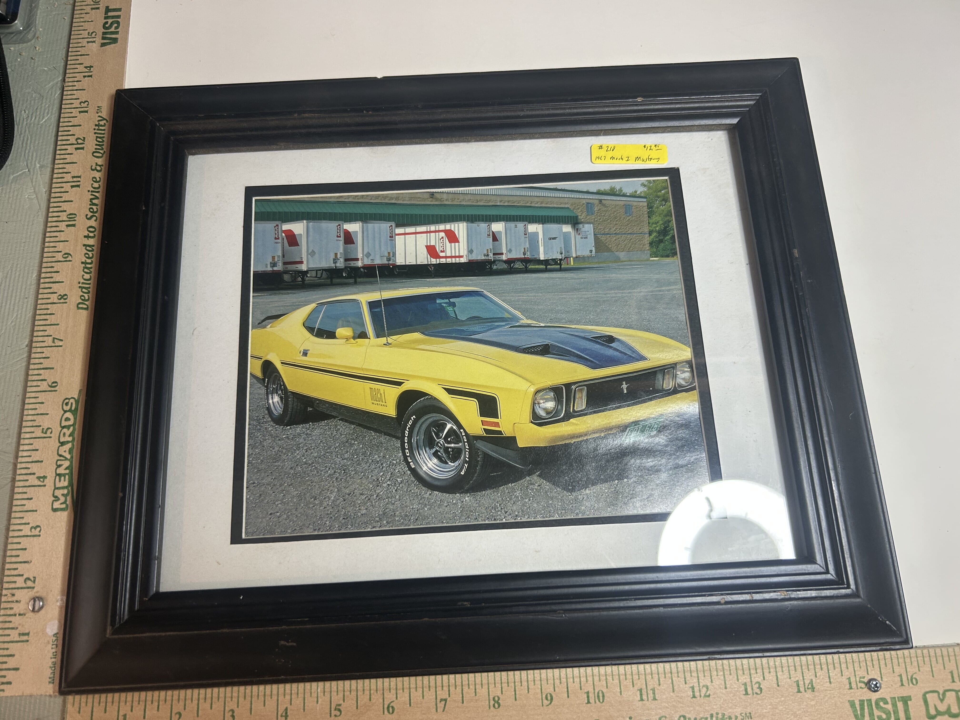 Framed photo of 1967 Ford Mach 1 Mustang, nice yellow with black stripes,hood and tail fin